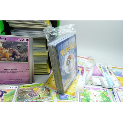 2185 - A box containing over 500 Pokemon cards with large quantity of Holographic