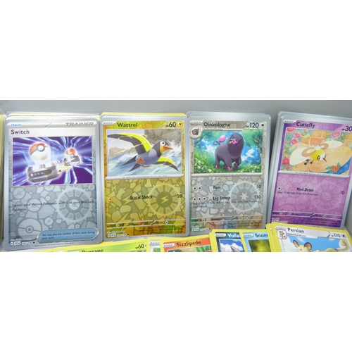 2186 - A box containing over 500 Pokemon cards with large quantity of Holographic