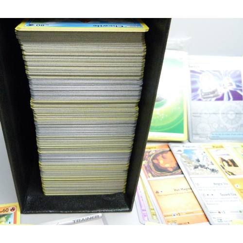 2186 - A box containing over 500 Pokemon cards with large quantity of Holographic