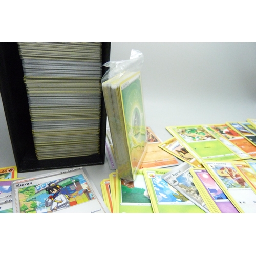 2186 - A box containing over 500 Pokemon cards with large quantity of Holographic