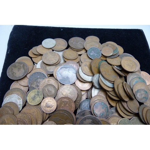 2198 - A collection of coins including Victorian pennies, foreign coins and one WWII medal