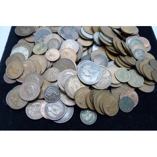 2198 - A collection of coins including Victorian pennies, foreign coins and one WWII medal