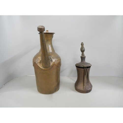 2209 - An Arabic Dallah coffee pot and one other Persian copper kettle