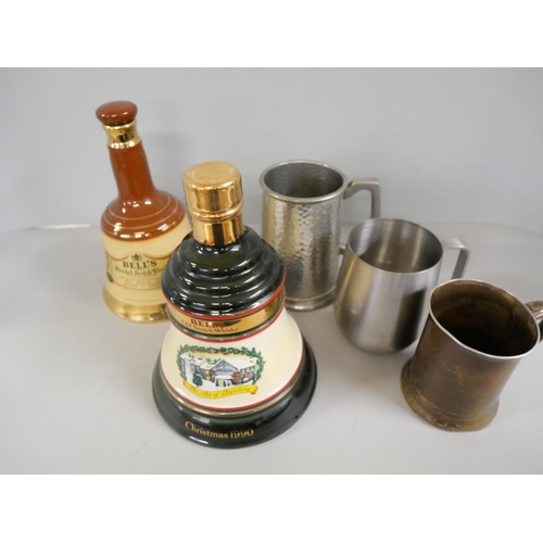 2222 - A Bell's whisky decanter, Christmas 1990, sealed and a Bell's blended Scotch whisky decanter, empty,... 