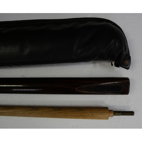 2229 - A 1980s Alex Higgins snooker cue in case