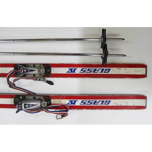 2231 - A pair of vintage Northland skis with a pair of Northland ski poles