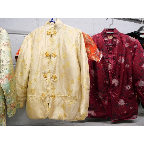 2251 - A collection of vintage Chinese silk embroidered and other clothing, including a matching jacket and... 