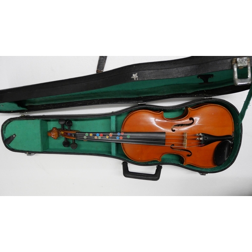 2269 - Two Chinese student violins, both cased, one lacking a bow