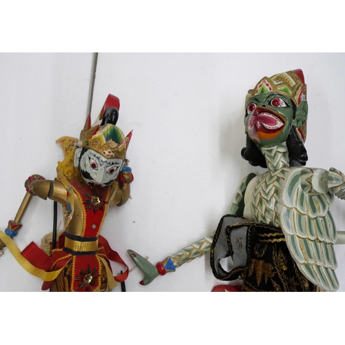 2288 - Two Indonesian wooden dancing puppets, one with loose head