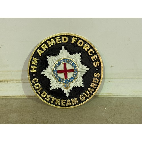 5186 - A circular cast metal Coldstream Guards HM Armed Forces Plaque* This lot is subject to VAT