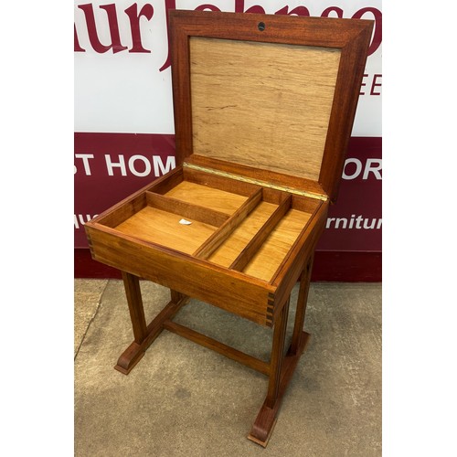 79 - A Danish teak sewing table