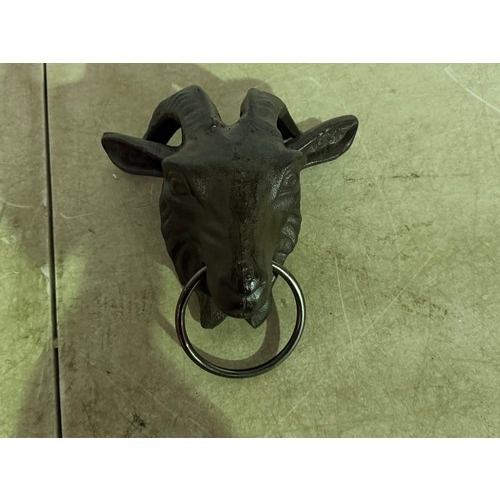 5154 - A cast metal decorative goat head with door knocker* This lot is subject to VAT