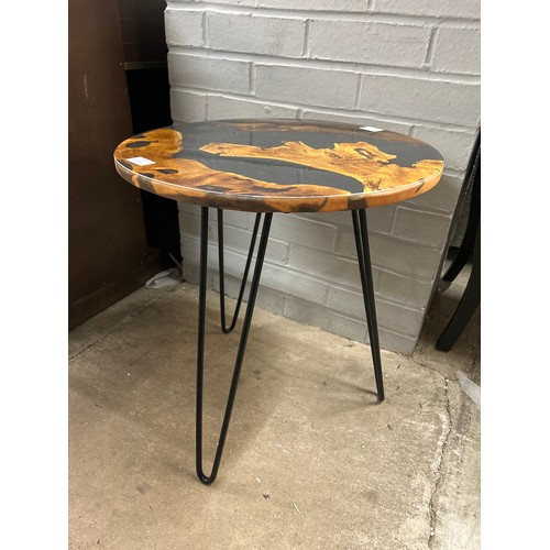 3051 - An epoxy side table  *This lot is subject to Vat