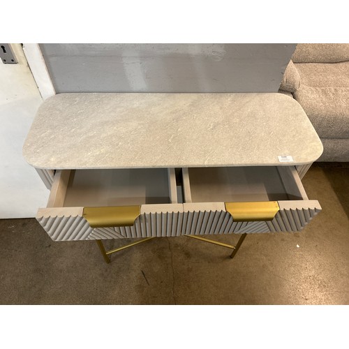 3109 - An Amiri marble top console table *This lot is subject to Vat