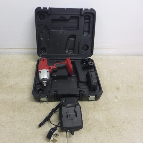 5088 - A cordless impact wrench with battery and charger and a selection of sockets - in case and an one ot... 