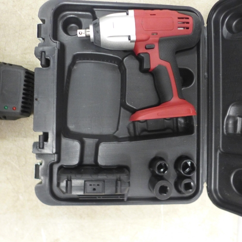 5088 - A cordless impact wrench with battery and charger and a selection of sockets - in case and an one ot... 