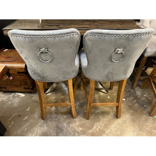 3230 - A pair of grey velvet Chennai bar stools (Damaged needs attention) *This lot is subject to Vat