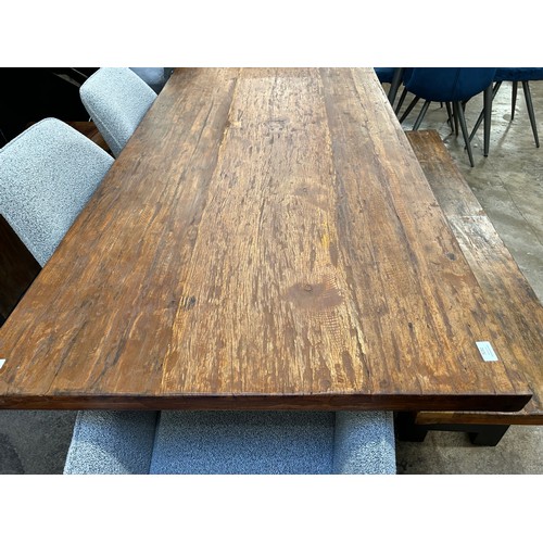 3232 - A Haryana dining table and bench *This lot is subject to Vat