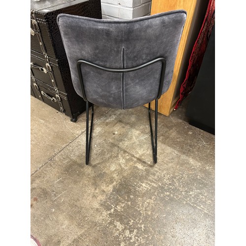 3251 - A grey velvet dining chair  *This lot is subject to Vat