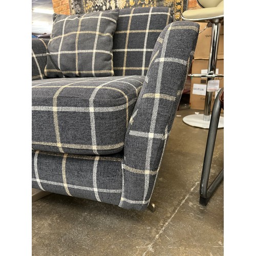 3267 - A Theo fabric pattern swivel chair and footstool