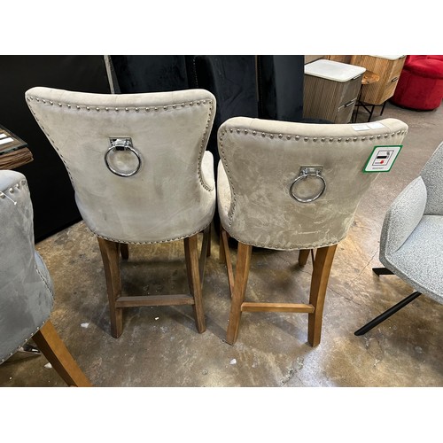 3231 - A pair of taupe velvet Chennai bar stools (Damaged needs attention) *This lot is subject to Vat