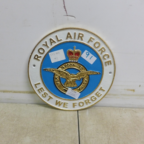 5193 - A circular cast metal RAF 