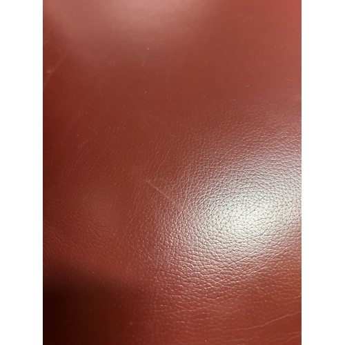 3281 - A burgundy faux leather dining chair