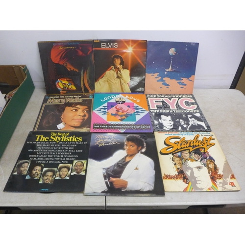 5253 - A collection of LP records including Status Quo, Elvis, ELO, etc.