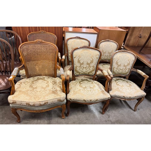 202 - Three pairs of French Louis XV style walnut and fabric upholstered fauteuil chairs