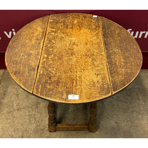 168 - An 18th Century style oak drop leaf occasional table