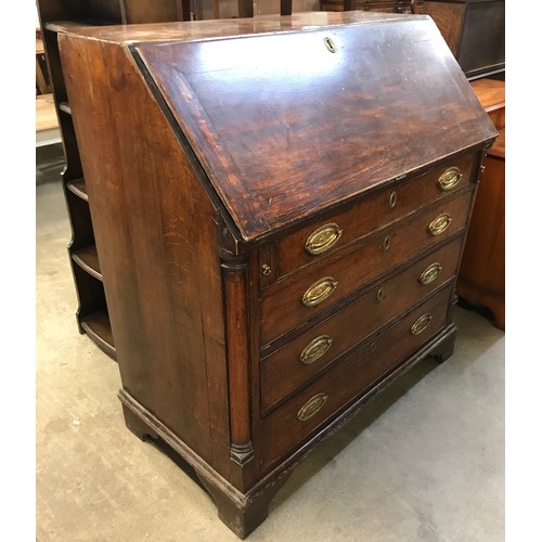 230 - A George III oak bureau