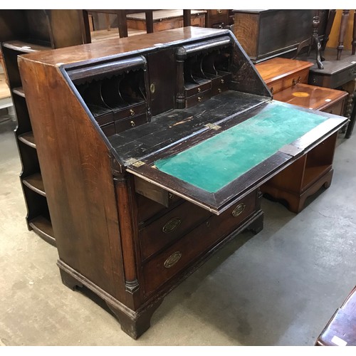 230 - A George III oak bureau