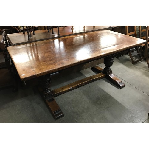 251 - An early 20th Century oak refectory table & a set of four oak dining chairs