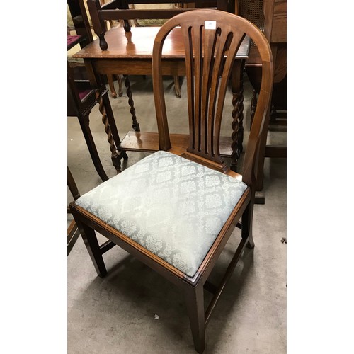 266 - A set of four George III style mahogany dining chairs