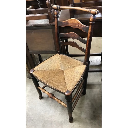 267 - A set of four 18th Century elm rush seated Macclesfield ladderback chairs