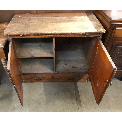 282 - A Victorian pine two door pantry cupboard