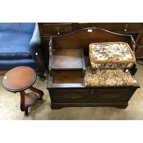 284 - An oak telephone seat, a Sherbourne footstool and a jardiniere stand