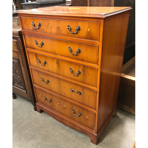 285 - A George III style yew wood chest of drawers