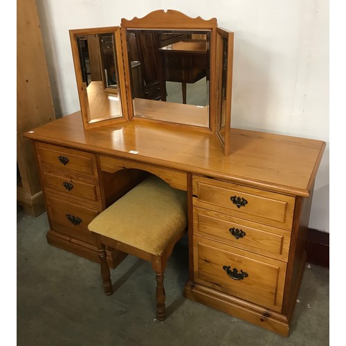 286 - A Victorian style pine dressing table and stool