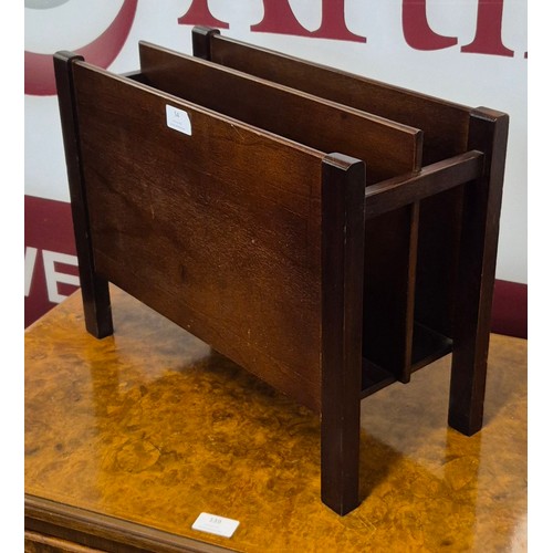 54 - A teak magazine rack