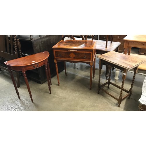 292 - A Regency style burr walnut media cabinet, an oak barleytwist table & a Regency style demi lune tabl... 