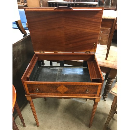 292 - A Regency style burr walnut media cabinet, an oak barleytwist table & a Regency style demi lune tabl... 