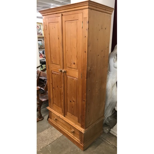 300A - A Victorian style pine wardrobe