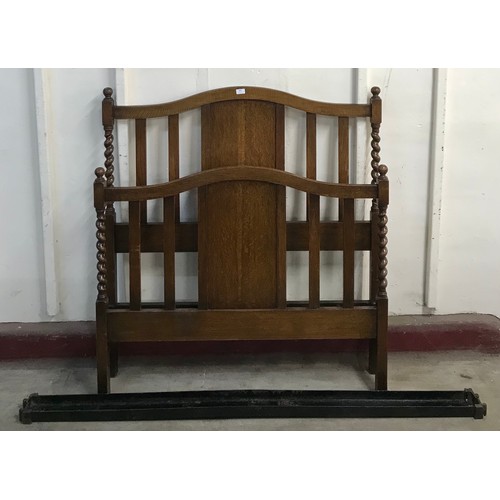 303 - An early 20th Century oak barleytwist double bed