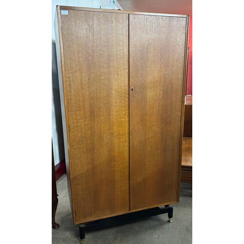 62 - A G-Plan Librenza oak and black wardrobe