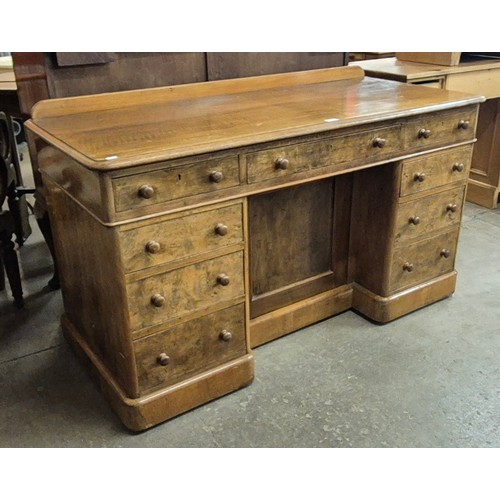 177 - A Victorian walnut kneehole desk