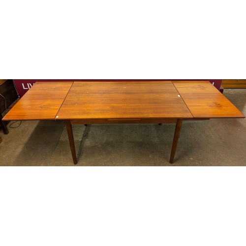 15 - A Danish teak extending dining table