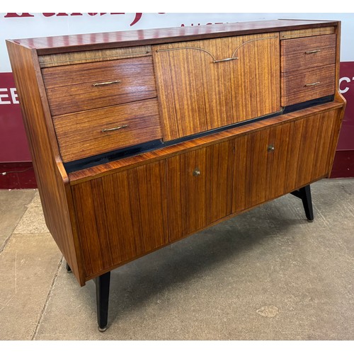 63 - A Beautility tola wood sideboard