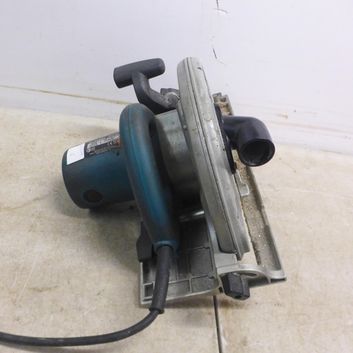 5049 - A Makita 110V, 5903R heavy duty power saw