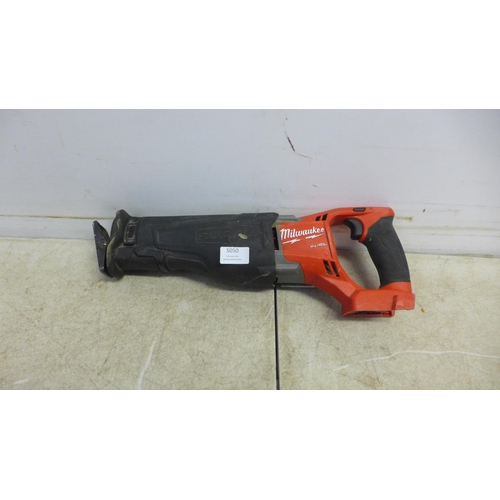 5050 - A Milwaukee M18 CSX, 18V cordless reciprocating saw, a Parkside PAPK12, 12V cordless circular saw an... 